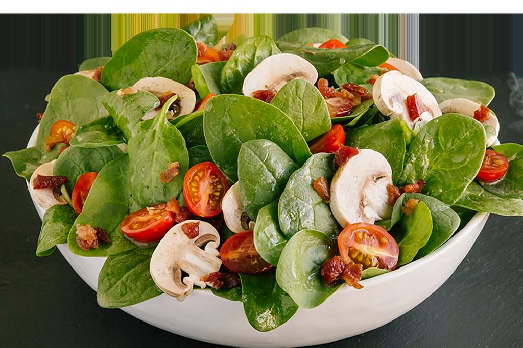 Spinach Salad · Spinach, bacon, mushrooms, tomatoes and house vinaigrette dressing.