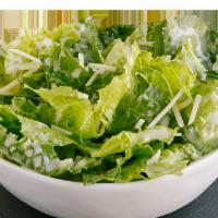 Caesar Side Salad · Romaine lettuce, parmesan cheese,  caesar dressing, and croutons.