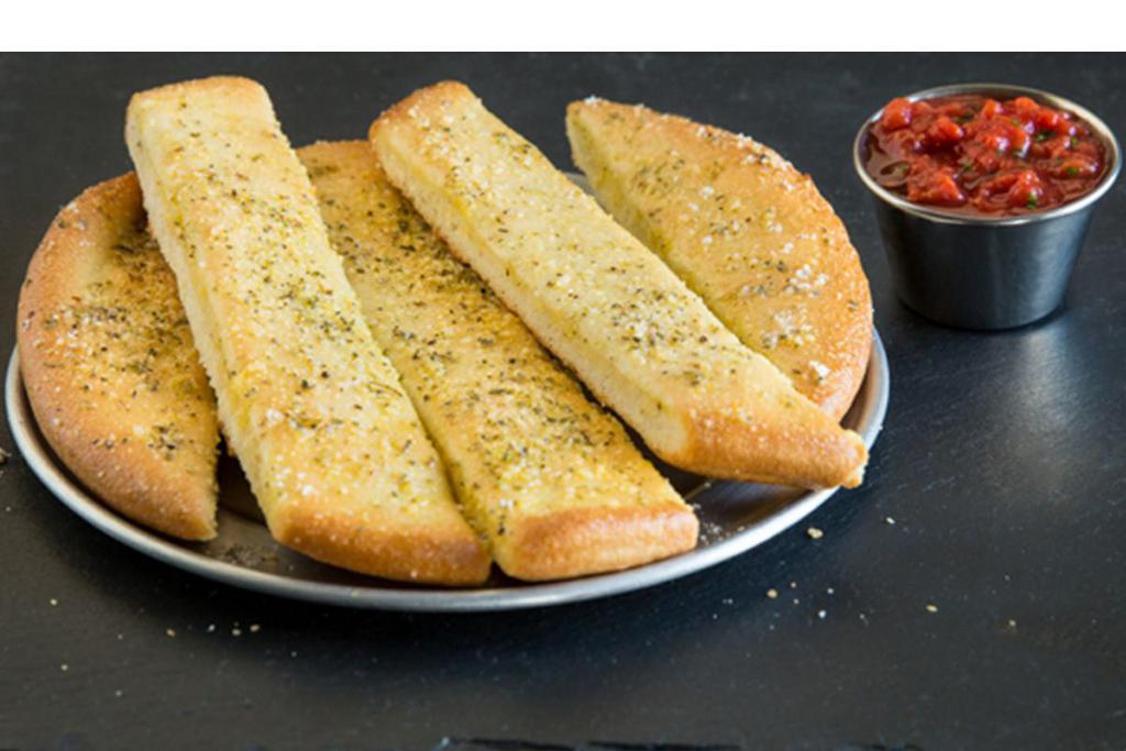 Garlic Butter Stix · Our classic pan pizza dough baked to perfection and topped with savory garlic butter & our special magic dust. 8 inch.