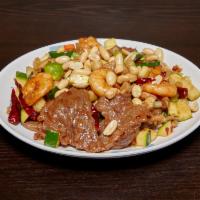 Kung Pao Combination · A combination of chicken, beef and shrimp with zucchini, celery, carrots and water chestnuts...