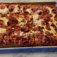 Colombo Pizza · Pepperoni, Italian sausage, Romano, garlic, oregano, tomato sauce.