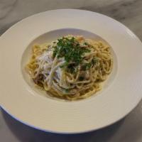 Linguini Carbonara · Pancetta, onion, peas, cream, garlic, Romano, cage-free egg.