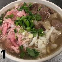 P1. House Special Pho · Rare steak well done, meatball, tendon and tripe.