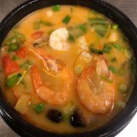 Creamy Tom Yum · Seafood sour soup with coconut milk.
