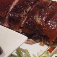 89. Peking Duck House Special · Boneless duck, wrapped in thin pancake with plum sauce and scallion. It's a famous dish in c...