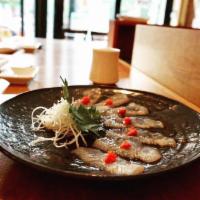Usuzukuri with Hirame · Thinly sliced fluke sashimi with ponzu sauce. 