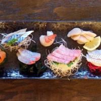 Yuzu Sashimi Set · Chefs choice of sashimi. Served with Miso soup