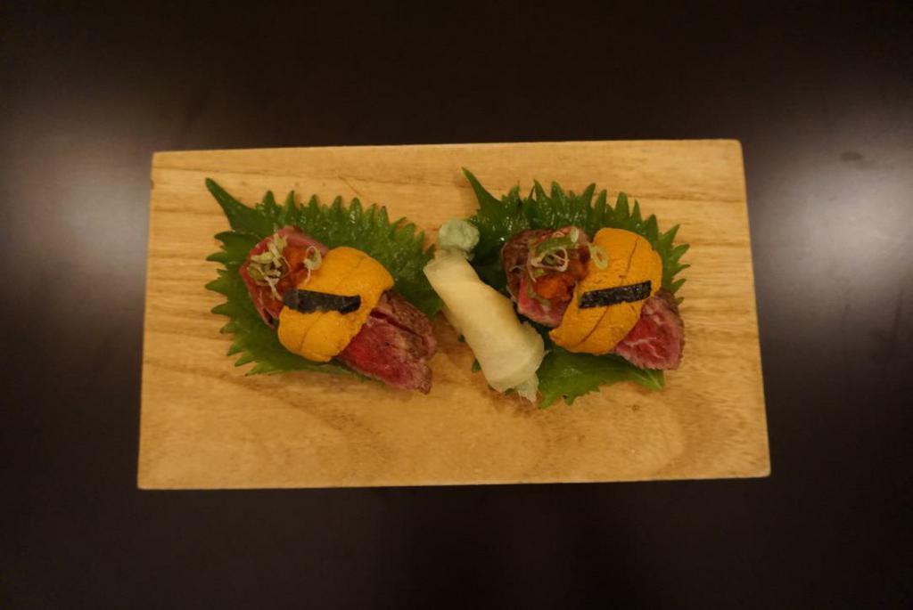 2 Niku Uni (Beef Uni) Sushi · Sushi with seared prime wagyu beef and uni 