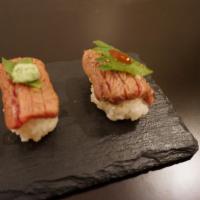 2 Wagyu Sushi  · Lightly grilled wagyu from Japan. 