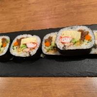 Futomaki  · Fat thick sushi roll with colorful fillings of tamago, kanpyo, carrot, cucumber, crabmeat, g...
