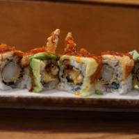 Shrimp Dragon roll · Shrimp tempura, cucumber, scallion, masago inside, grilled eel and avocado over with eel sau...