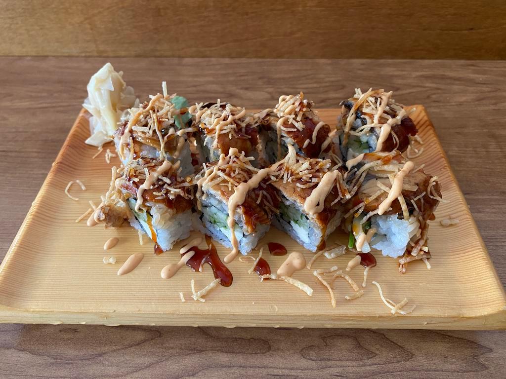 Unagi Roll  · Grilled unagi over with cucumber and cream cheese inside. Eel sauce over. 
