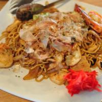 Seafood Yakisoba · Scallops and shrimp, soba noodles, Asian cabbage, carrots, red onions, edamame and mushrooms.