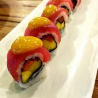 Mango Tango Roll · Mango, green & yellow peppers, Cilantro; wrapped with Avocado and Tuna; topped with a Mango ...