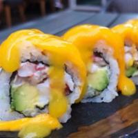 Lobster Roll · Fresh Maine lobster, avocado, Kani Kama crabmeat, topped off with fresh mango