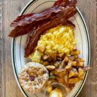 2 Eggs Breakfast · Cooked any style, Mama's potatoes, choice of meat, and Mama's bacon biscuit.