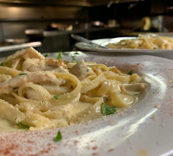 Fettucine Alfredo  · Ribbon noodles with a blend of Parmesan cheese, cream and butter. Served with homemade garlic rolls and house salad or soup.