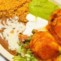 Two Chile Rellenos Plate · Served with rice, beans, guacamole, sour cream, lettuce, tomatoes and tortillas.