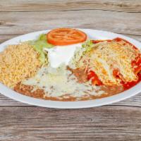 Enchilada Plate · 3 enchiladas with choice of meat, rice, beans, cheese, sour cream, guacamole, lettuce and to...