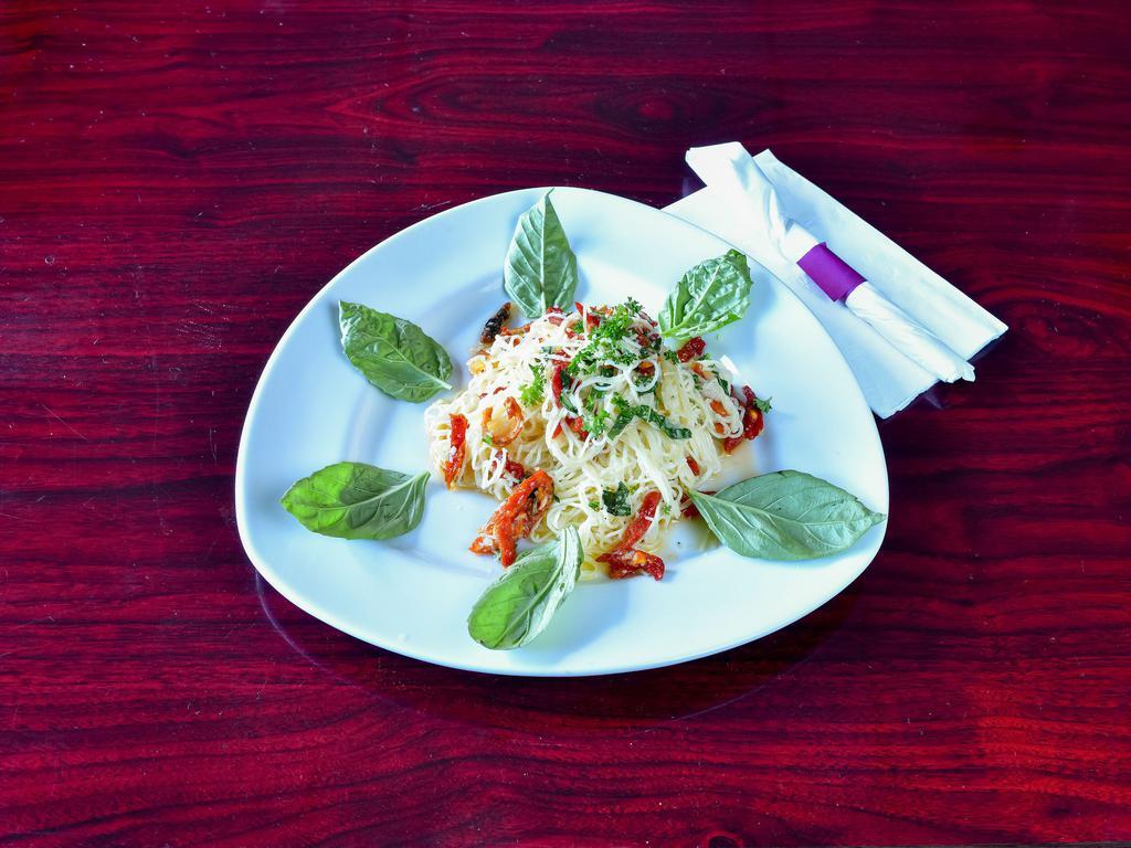 Pasta with Basilico Sauce · Sun-dried tomatoes, fresh basil, garlic, Southern olive oil.