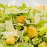 Caesar Salad · Crisp romaine, shaved Parmesan, garlic Parmesan croutons and homemade Caesar dressing. Add f...