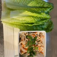 Larb Cups  · Traditional Thai salad. Finely chopped chicken, scallion, fresh mint, carrot, onion and cila...