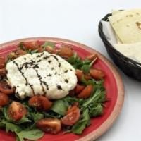 Bufala Salad · Served with arugula and cherry tomatoes. Serves four.

Please be aware that all catering ord...