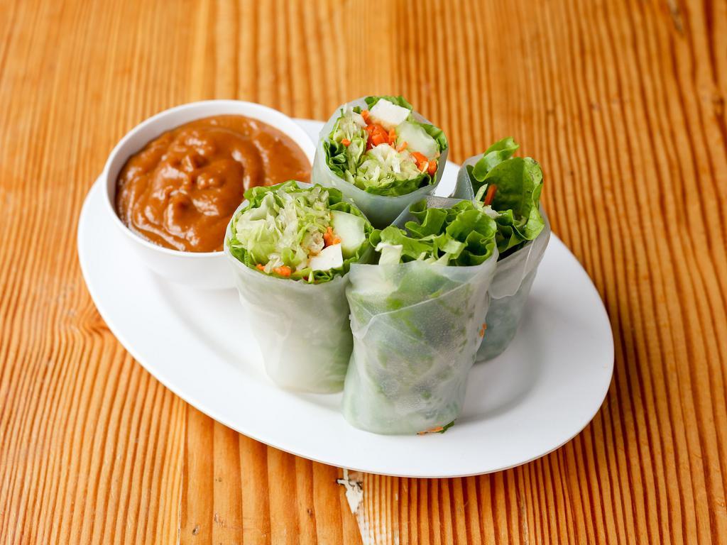 10. Fresh Summer Rolls (2) · Green leaf, bean sprouts, carrots, cucumbers, and tofu wrapped in rice pepper and mint. Served with Thai peanut sauce. Gluten free. Contains tofu and peanut.  