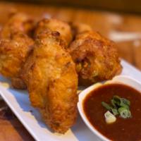 44. Chicken Wings (5) · Lightly battered in rice flour marinated with home made curry paste and coconut milk. Gluten...