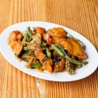 53. Pad Char Pla · Thai catfish lightly battered in rice flour and deep fried with fresh chili wild ginger, gre...