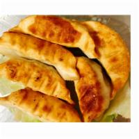 2. Pot Stickers · 6 pieces Pot Stickers made in with Chicken, Pork and Vegetables, damping lightly Pan-fried. ...