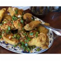 9. Salt & Pepper Chicken Wings · 6 Pcs Chicken Wings after deep fried in Vegetable oil then stir-fried with the salt and pepp...
