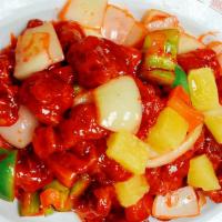 30. Sweet and Sour Pork over Rice · Sweet and Sour Pork with a bed of steamed White Rice..