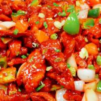 31. Sweet and Sour Chicken over Rice · Sweet and Sour Chicken with a bed of steamed White Rice..