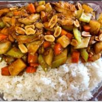 36. Kung Pao Chicken over Rice · Classic Kung Pao Chicken made with white meat Chicken over a bed of steamed White Rice.