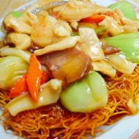 49. Hong Kong Style Crispy Chow Mein · Lightly pan fried Hong Kong style egg noodles topped with mixed fish shrimp Calamari and sea...