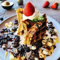 West Hollywood Waffle · Oreo cookie, whipped cream, chocolate chips, chocolate sauce.