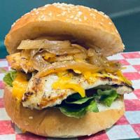 Grilled Chicken Sandwich · Perfectly marinated chicken grilled with sauteed onions, cheddar cheese, lettuces, tomatoes ...