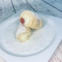 Cream Horn · Flaky pastry dough horns filled to order with Bavarian custard cream and sprinkled with powd...