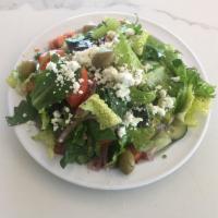 Greek Salad (half) · Mixed greens, lettuce, tomatoes, cucumbers and onions topped with feta cheese and olives.