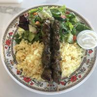 Lamb Kabobs Plate · 2 lamb skewers served with rice pilaf, salad, and tzatziki. Served with pita bread.