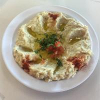 Baba Ghanouj Dip · Fire roasted eggplant dip served with pita.