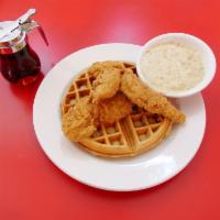 Chicken and Waffles · One Belgian waffle topped with chicken tenders and served with a side of sausage gravy.