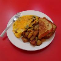 Farmers Omelet · Savory sausage, spinach, tomato, mushrooms and cheddar cheese.