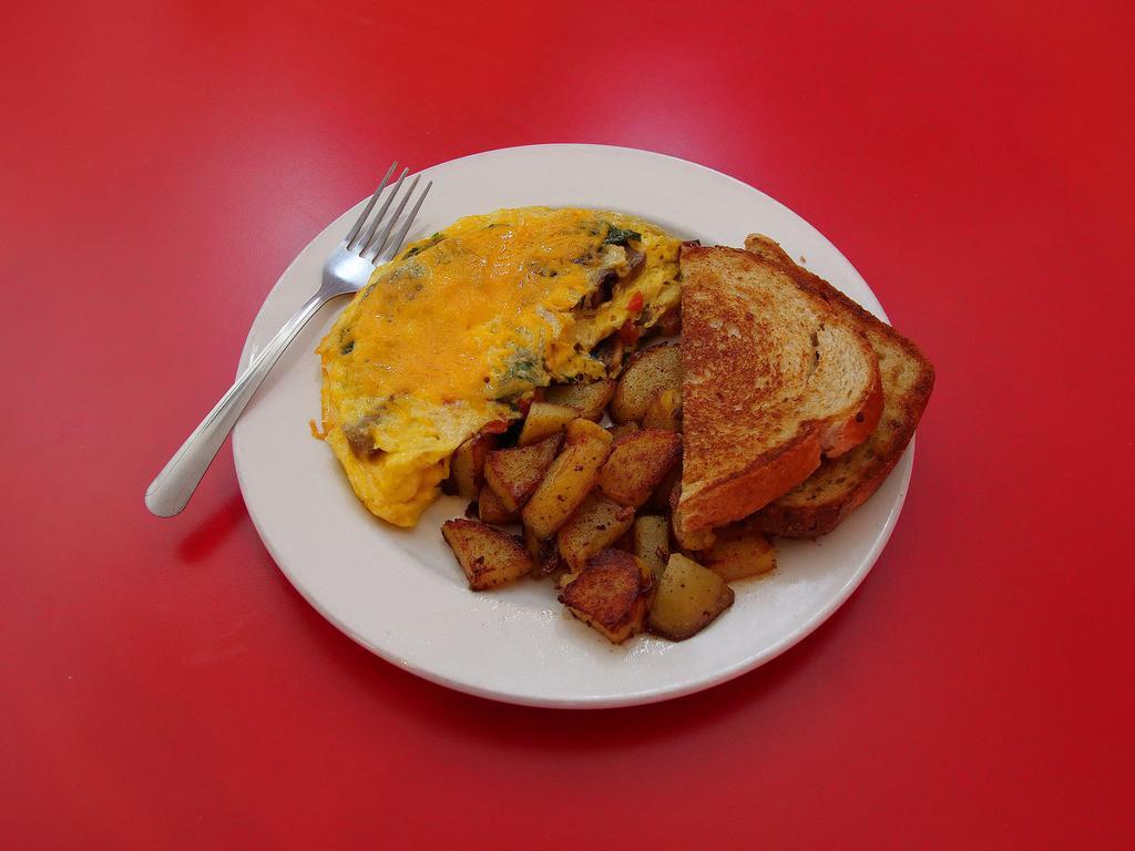 Farmers Omelet · Savory sausage, spinach, tomato, mushrooms and cheddar cheese.