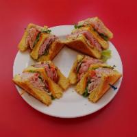 Club Sandwich · Shaved ham, turkey, Swiss, cheddar, bacon, lettuce, tomato and mayo stacked on Texas toast.