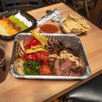 Large Fajita Pack Combo · Feeds 5- 8 people. Sampling of our offerings: grilled steak, grilled chicken, grilled marina...