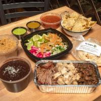 BYOT (build your own) Taco Pack · Tacos presented in a build your own format.  Includes 1 pound of choice of Protein: Carnitas...