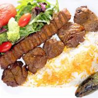 6. Soltani Combo Plate · 1 skewer filet mignon, 1 skewer of ground beef kabob. Served with hummus, white basmati rice...