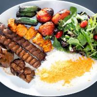 13. Family Combo Plate · 4 pieces of shish kabob, 4 pieces of chicken kabab, 2 ground beef, include salad and cucumbe...
